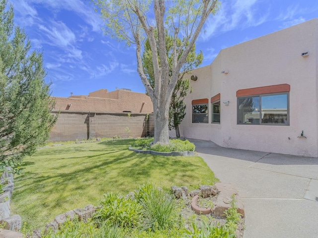 7417 Maplewood Dr NW, Albuquerque, NM 87120 - view of yard featuring a gate, fence, and a patio area
