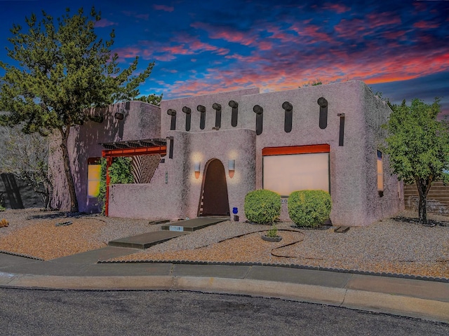 7417 Maplewood Dr NW, Albuquerque, NM 87120 - southwest-style home with stucco siding and an attached garage