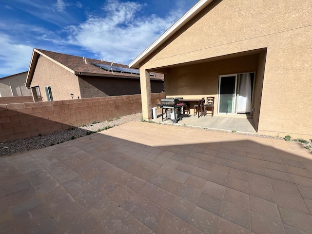 view of patio / terrace with fence