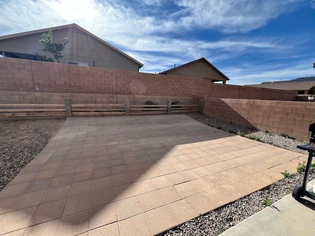 view of patio with a fenced backyard