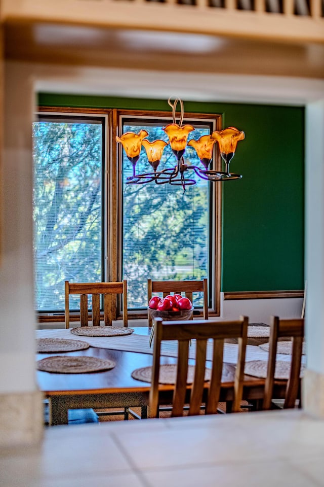 6 Storyteller Ct, Sandia Park, NM 87047 - dining space featuring plenty of natural light and a chandelier