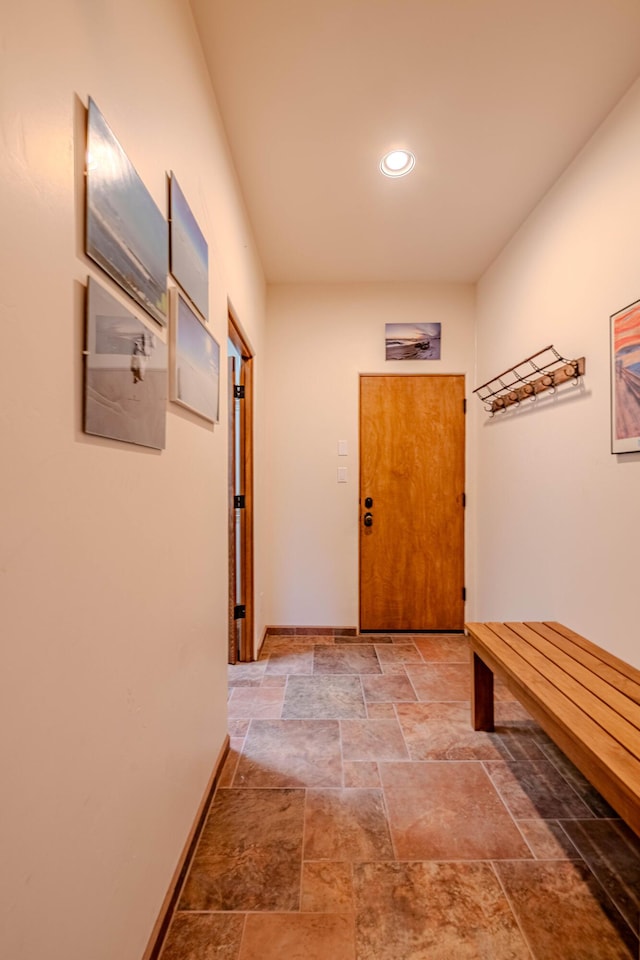 6 Storyteller Ct, Sandia Park, NM 87047 - hallway with stone finish floors and recessed lighting