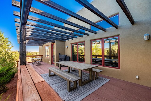 6 Storyteller Ct, Sandia Park, NM 87047 - wooden terrace with outdoor dining space and a pergola