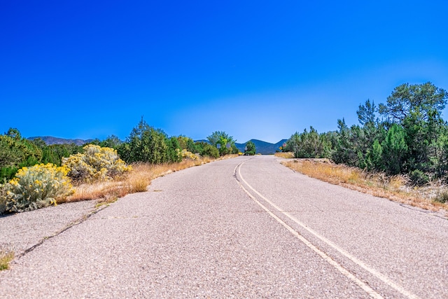 6 Storyteller Ct, Sandia Park, NM 87047 - view of asphalt road