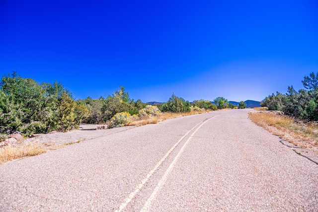 6 Storyteller Ct, Sandia Park, NM 87047 - view of asphalt road