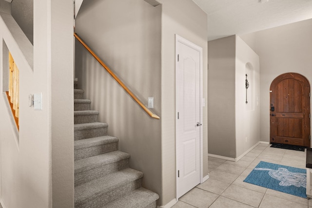 4201 High Mesa Rd SE, Rio Rancho, NM 87124 - tiled entrance foyer with stairway and baseboards