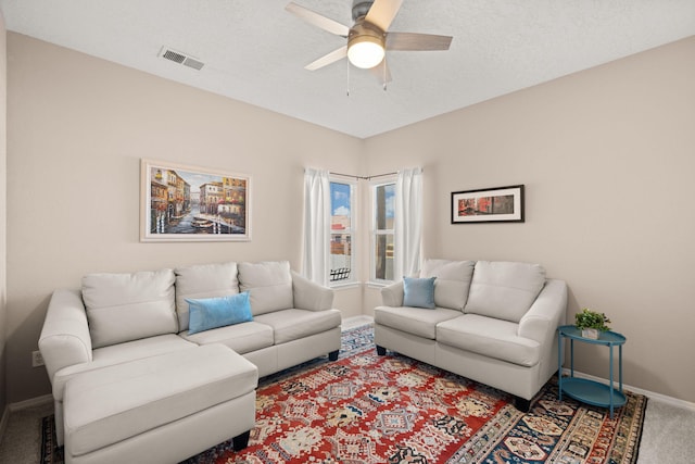 4201 High Mesa Rd SE, Rio Rancho, NM 87124 - living room with carpet flooring, ceiling fan, and baseboards