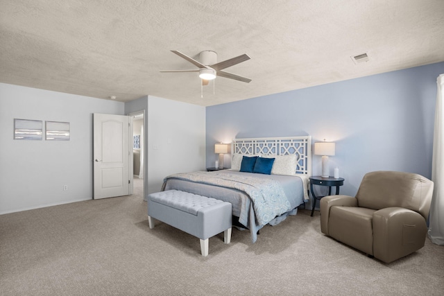 4201 High Mesa Rd SE, Rio Rancho, NM 87124 - bedroom with carpet flooring, a textured ceiling, a ceiling fan, and baseboards