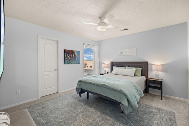 4201 High Mesa Rd SE, Rio Rancho, NM 87124 - bedroom with carpet floors, a textured ceiling, a ceiling fan, and baseboards