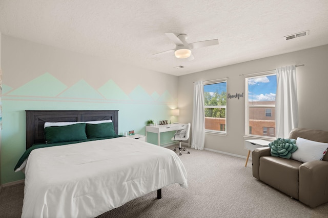 4201 High Mesa Rd SE, Rio Rancho, NM 87124 - carpeted bedroom featuring a textured ceiling, baseboards, and ceiling fan