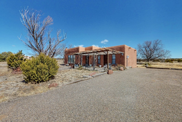 view of front of house with stucco siding