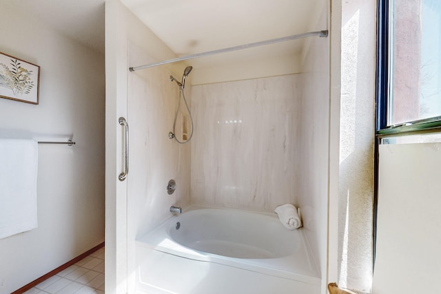 bathroom with tile patterned flooring and shower / bath combination