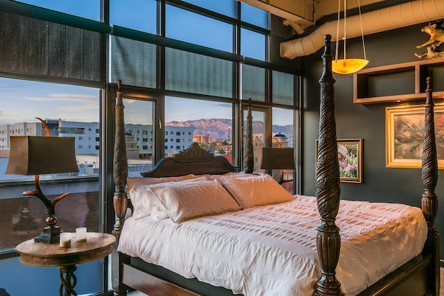 100 Gold Ave SW Unit 404, Albuquerque, NM 87102 - bedroom with a high ceiling and a mountain view