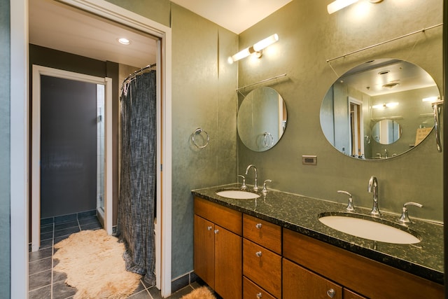 100 Gold Ave SW Unit 404, Albuquerque, NM 87102 - full bathroom featuring tile patterned flooring, double vanity, and a shower stall
