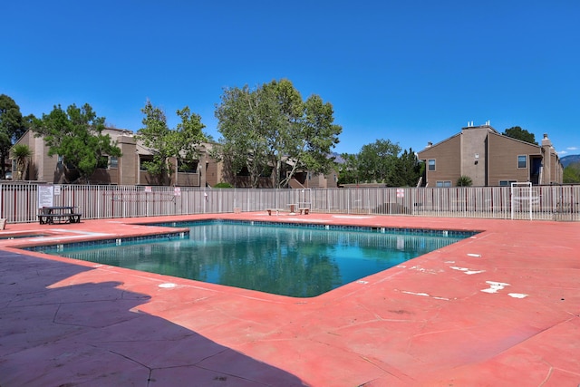 3829 Montgomery Blvd NE Unit 301, Albuquerque, NM 87109 - community pool featuring fence and a patio area