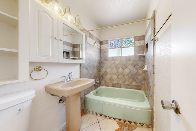 bathroom with shower / bath combination, tile patterned flooring, and toilet