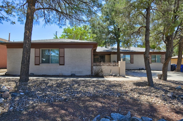 ranch-style home with brick siding