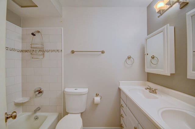 full bath with washtub / shower combination, toilet, double vanity, and a sink