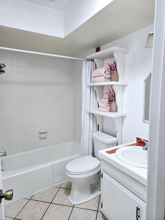 bathroom featuring vanity, shower / bath combination with curtain, toilet, and tile patterned flooring