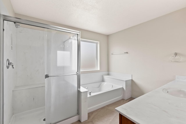 10515 Bilboa St NW, Albuquerque, NM 87114 - full bath featuring a stall shower, a garden tub, a textured ceiling, and vanity