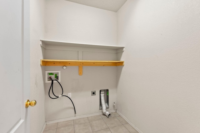 10515 Bilboa St NW, Albuquerque, NM 87114 - laundry room with hookup for an electric dryer, light tile patterned floors, laundry area, hookup for a washing machine, and baseboards