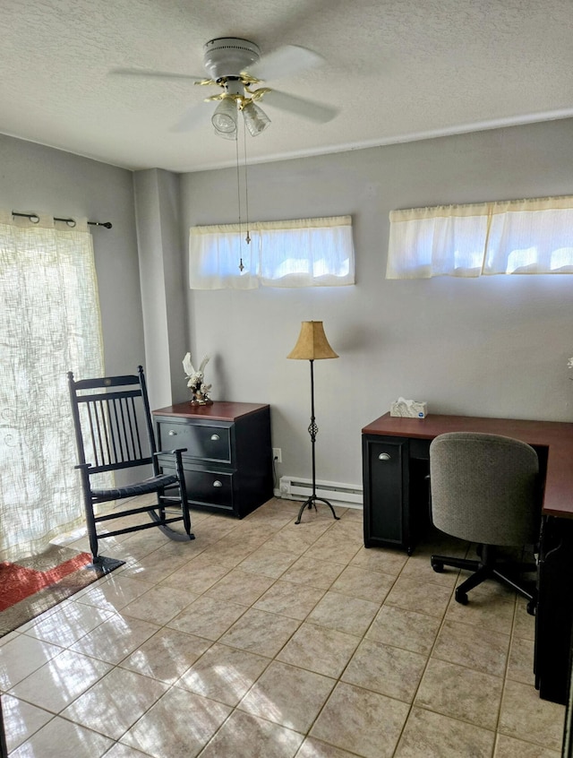 3404 Esplanade Pl SE, Rio Rancho, NM 87124 - office area featuring a baseboard radiator, a ceiling fan, light tile patterned floors, and a textured ceiling