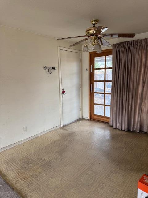 10509 San Jacinto Ave NE, Albuquerque, NM 87112 - unfurnished room with light floors, baseboards, and a ceiling fan