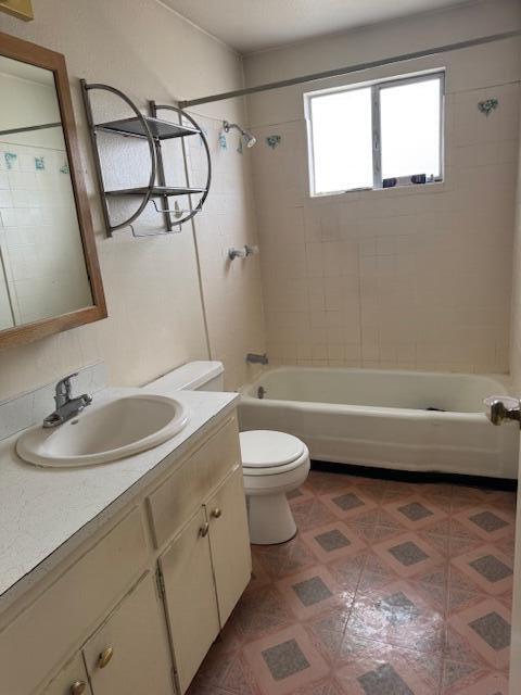 10509 San Jacinto Ave NE, Albuquerque, NM 87112 - full bath with vanity, toilet, and shower / tub combination