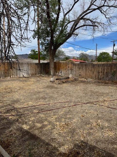 10509 San Jacinto Ave NE, Albuquerque, NM 87112 - view of yard with a fenced backyard
