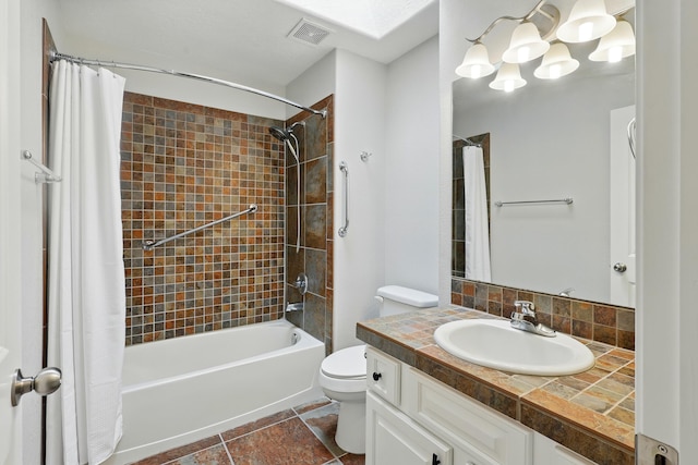 bathroom with visible vents, shower / bath combo with shower curtain, toilet, and vanity