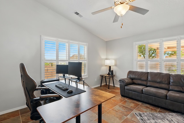 office space featuring visible vents, a ceiling fan, high vaulted ceiling, and baseboards