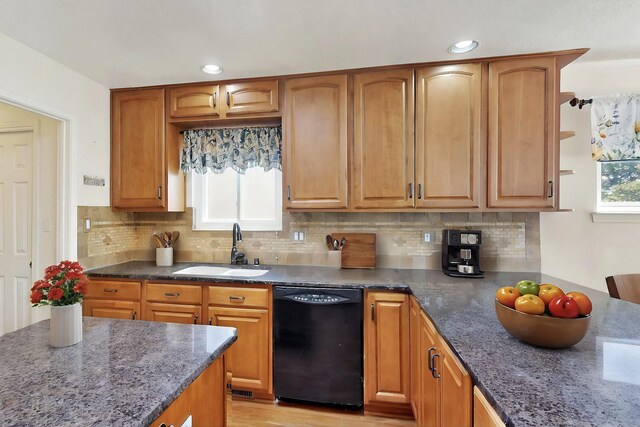 4532 Habershaw Rd NW, Albuquerque, NM 87120 - kitchen featuring black dishwasher, a sink, dark stone counters, backsplash, and recessed lighting