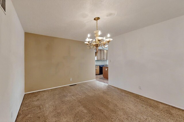 4532 Habershaw Rd NW, Albuquerque, NM 87120 - spare room featuring a chandelier, light carpet, and baseboards