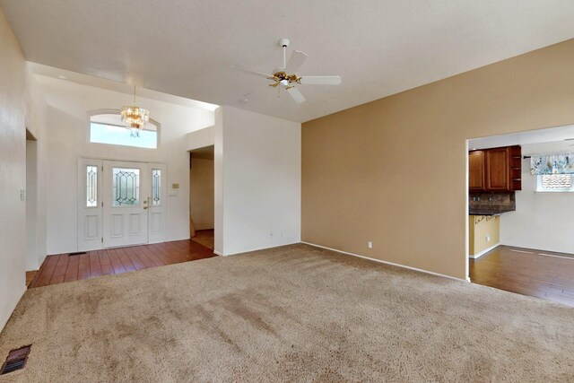 4532 Habershaw Rd NW, Albuquerque, NM 87120 - carpeted entrance foyer featuring a chandelier and a ceiling fan
