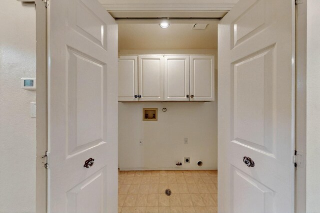 4532 Habershaw Rd NW, Albuquerque, NM 87120 - laundry area featuring electric dryer hookup, washer hookup, cabinet space, hookup for a gas dryer, and light tile patterned flooring