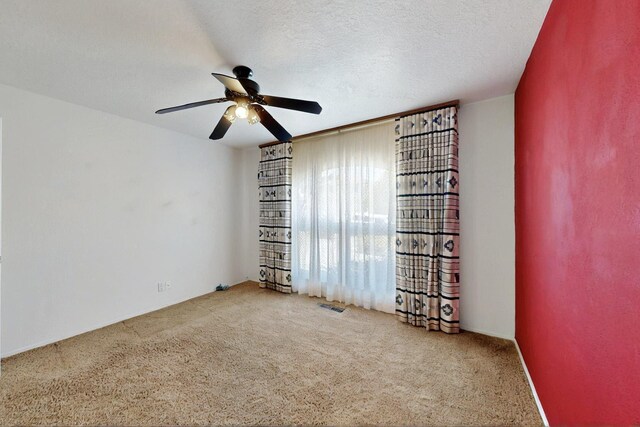 4532 Habershaw Rd NW, Albuquerque, NM 87120 - carpeted spare room with ceiling fan