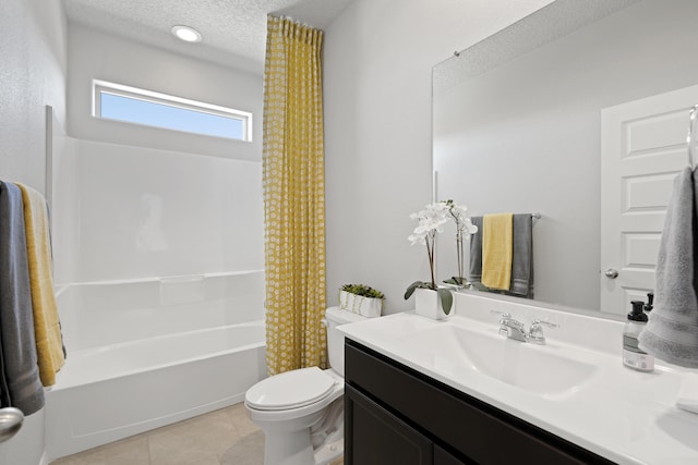 full bathroom with tile patterned floors, shower / bath combo, a textured ceiling, toilet, and vanity