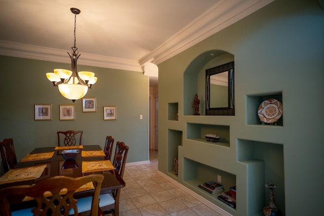 dining room featuring ornamental molding, a notable chandelier, light tile patterned floors, and built in features