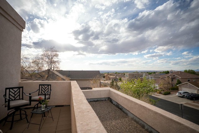 balcony featuring a residential view