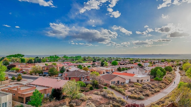 bird's eye view with a residential view and a water view