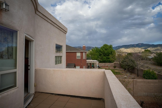 balcony featuring a mountain view