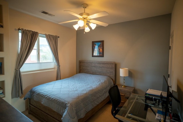 bedroom with visible vents and ceiling fan