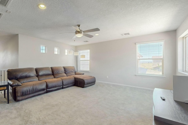 living room with visible vents, ceiling fan, baseboards, carpet floors, and recessed lighting