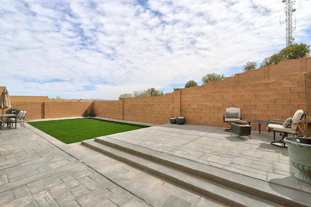 6952 Napoleon Rd NE, Rio Rancho, NM 87144 - view of patio with a fenced backyard