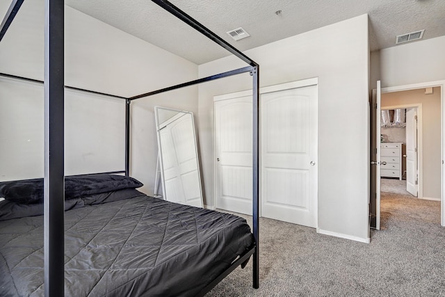 6952 Napoleon Rd NE, Rio Rancho, NM 87144 - bedroom with baseboards, carpet flooring, a textured ceiling, and visible vents