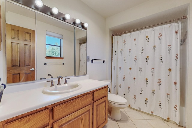 full bathroom with toilet, tile patterned floors, vanity, and a shower with shower curtain