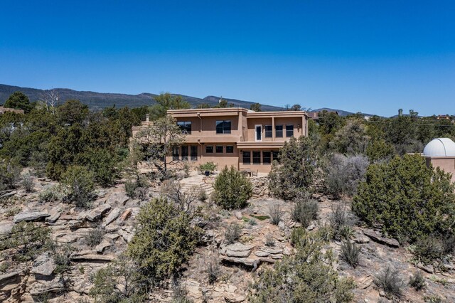 exterior space with a mountain view