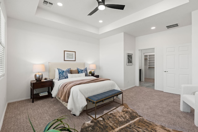 bedroom with baseboards, carpet, and visible vents
