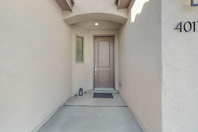 4017 Windy Rd NE, Rio Rancho, NM 87144 - doorway to property with stucco siding