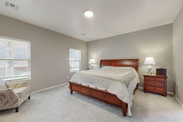 4017 Windy Rd NE, Rio Rancho, NM 87144 - bedroom with light colored carpet, visible vents, and baseboards